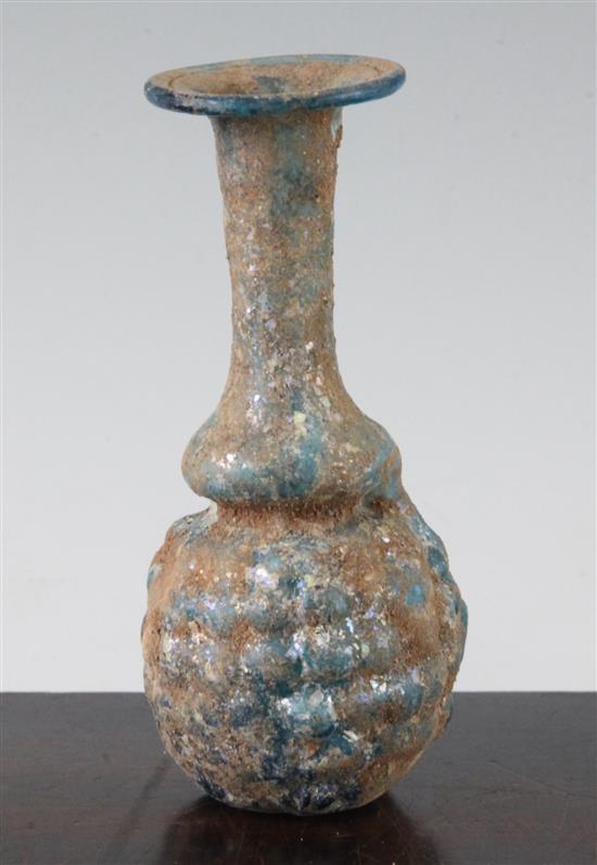 A Roman turquoise glass grape flask, Syria 1st / 2nd century AD, 13.5cm